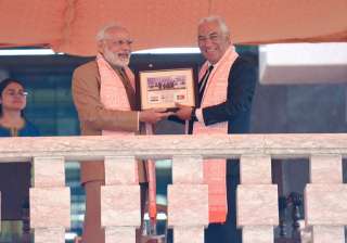 Modi presents OCI card to Portugal's... Modi presents OCI card to Portugal's...