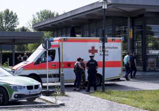 An ambulance stands near a subway station in... An ambulance stands near a subway station in...