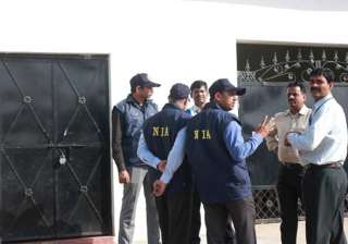 NIA raids 14 places in Kashmir, 8 in Delhi in... NIA raids 14 places in Kashmir, 8 in Delhi in...