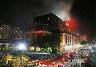 At least 36 killed after gunman sets fire to... At least 36 killed after gunman sets fire to...