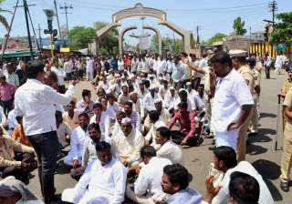 Farmers block the road during a protest in... Farmers block the road during a protest in...