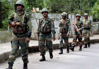 Army patrols a street following clashes between... Army patrols a street following clashes between...