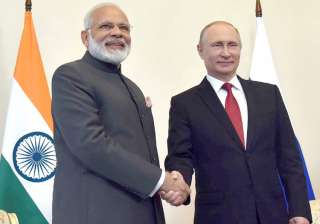 PM Narendra Modi meets Russian President Vladimir... PM Narendra Modi meets Russian President Vladimir...