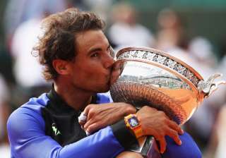 Rafael Nadal of Spain celebrates victory with the... Rafael Nadal of Spain celebrates victory with the...