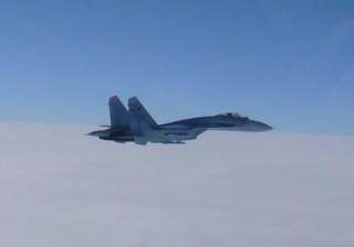 Russia said its Su-27 fighter jet intercepted an... Russia said its Su-27 fighter jet intercepted an...