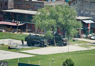 Srinagar: Bullet proof vehicles stationed in the... Srinagar: Bullet proof vehicles stationed in the...