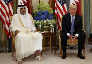 Trump in a bilateral meeting with Qatar's Emir in... Trump in a bilateral meeting with Qatar's Emir in...