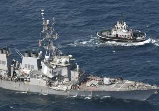 US Navy ship damaged in collision with container... US Navy ship damaged in collision with container...