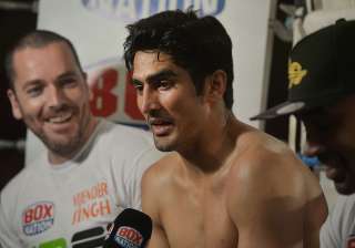 Vijender Singh speaks during a media conference -... Vijender Singh speaks during a media conference -...