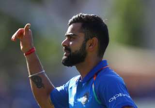 Virat Kohli of India celebrates as he leaves the... Virat Kohli of India celebrates as he leaves the...