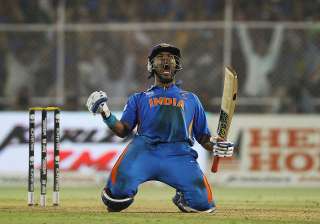 Yuvraj Singh of India celebrates after hitting... Yuvraj Singh of India celebrates after hitting...