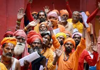 Jammu: Sadhus wait in a queue to register... Jammu: Sadhus wait in a queue to register...