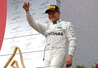 Valterri Bottas reacts after winning the Austrian... Valterri Bottas reacts after winning the Austrian...