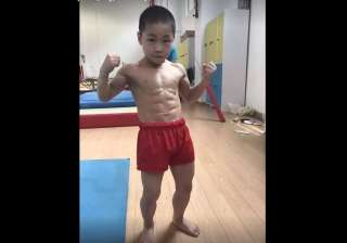 7 year old china boy with 8 pack abs - India TV 7 year old china boy with 8 pack abs - India TV