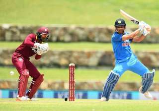 MS Dhoni plays a shot against West Indies. -... MS Dhoni plays a shot against West Indies. -...