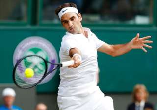 Roger Federer in action in Wimbledon 2017. -... Roger Federer in action in Wimbledon 2017. -...
