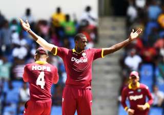 Jason Holder (C) celebrates after dismissing... Jason Holder (C) celebrates after dismissing...