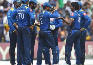 Lakshan Sandakan celebrates with his teammates -... Lakshan Sandakan celebrates with his teammates -...