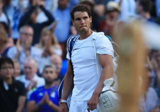 Rafael Nadal reacts after losing the match. -... Rafael Nadal reacts after losing the match. -...