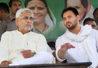 File pic - Nitish and Tejaswi at an event -... File pic - Nitish and Tejaswi at an event -...