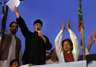Pak court orders seizure of Imran Khan, Tahirul... Pak court orders seizure of Imran Khan, Tahirul...