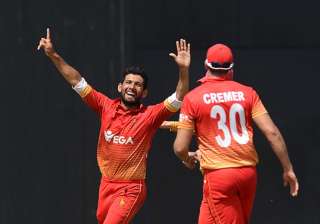 Sikander Raza celebrates a wicket. - India TV Sikander Raza celebrates a wicket. - India TV