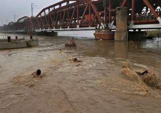 Major rivers in UP flowing above danger mark -... Major rivers in UP flowing above danger mark -...
