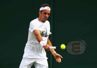 Roger Federer of Switzerland plays a backhand... Roger Federer of Switzerland plays a backhand...