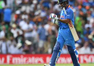 Shikhar Dhawan of India leaves the field - India... Shikhar Dhawan of India leaves the field - India...