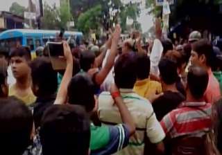 TMC-BJP supporters clash after RSS activist... TMC-BJP supporters clash after RSS activist...