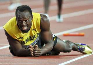 Usain Bolt bows out with injury in last race -... Usain Bolt bows out with injury in last race -...