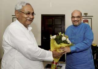 Nitish Kumar greets Amit Shah in a meeting at the... Nitish Kumar greets Amit Shah in a meeting at the...