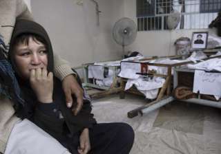 File - A Pak boy, whose brother was killed in... File - A Pak boy, whose brother was killed in...