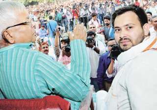 Lalu Prasad Yadav and son Tejashwi Yadav - India... Lalu Prasad Yadav and son Tejashwi Yadav - India...