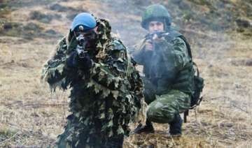 With an eye on 'expansionist' China, India trains... With an eye on 'expansionist' China, India trains...