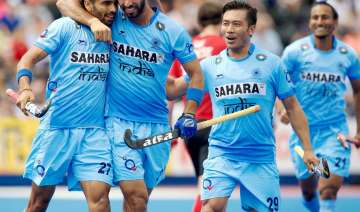 Indian hockey team wear black arm bands to... Indian hockey team wear black arm bands to...
