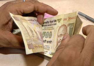 rupee recovers back from historic lows ends fy14... rupee recovers back from historic lows ends fy14...