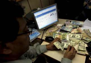 rupee ends flat at 52.55/56 vs dollar - India TV rupee ends flat at 52.55/56 vs dollar - India TV