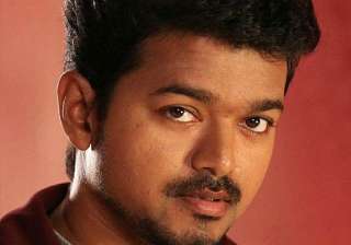 vijay pays ailing fan a surprise visit - India TV vijay pays ailing fan a surprise visit - India TV