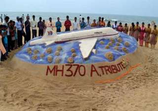 lost malaysian jet mh 370 gets tribute from sand... lost malaysian jet mh 370 gets tribute from sand...