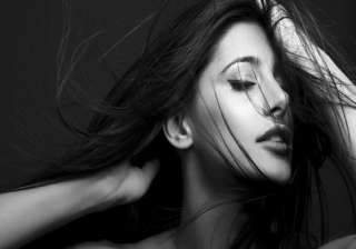 nargis fakhri busy as a bee - India TV nargis fakhri busy as a bee - India TV