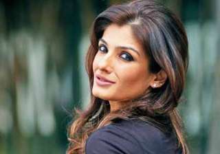raveena tandon counters delhi heat with her red... raveena tandon counters delhi heat with her red...