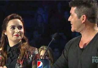 demi lovato not afraid of making simon cowell... demi lovato not afraid of making simon cowell...