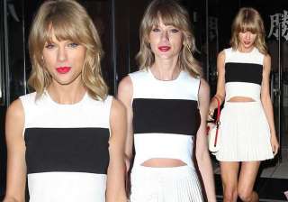 swift flaunts legs in tiny white skirt - India TV swift flaunts legs in tiny white skirt - India TV