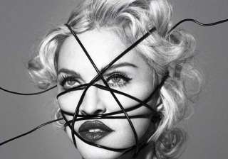 madonna defends altered photos of martin luther... madonna defends altered photos of martin luther...
