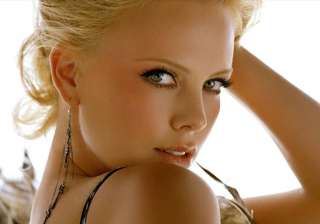 charlize theron wants low key wedding - India TV charlize theron wants low key wedding - India TV