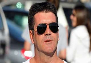 is simon cowell going to be a dad - India TV is simon cowell going to be a dad - India TV