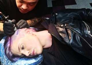 kelly osbourne shocks with tattoo on side of her... kelly osbourne shocks with tattoo on side of her...