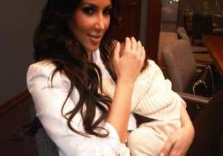 kim happy babysitting daughter - India TV kim happy babysitting daughter - India TV
