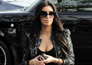 kim kardashian shows off ample cleavage even at... kim kardashian shows off ample cleavage even at...